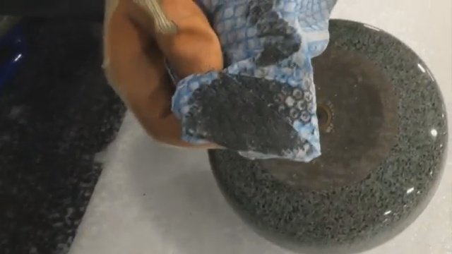 how to clean a curling stone